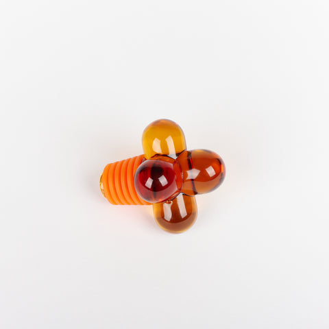 Areaware Hobknob Bottle Stopper in amber orange glass