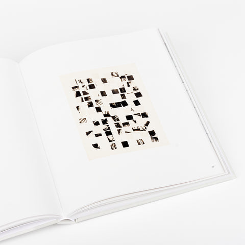 open view of Ellsworth Kelly art book showing an abstract artwork with black squares
