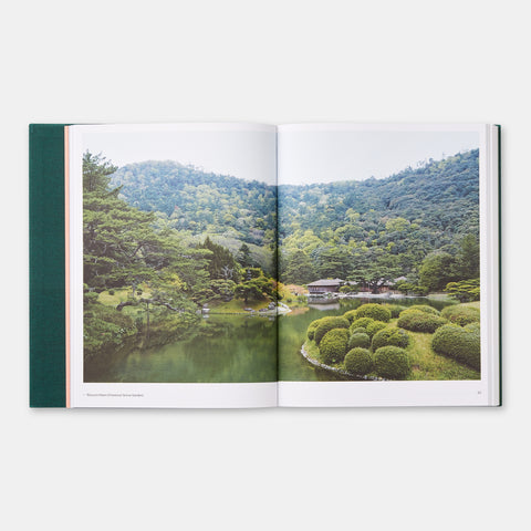 view inside Phaidon design book The Japanese Garden showing a photograph of a lush green Japanese landscape