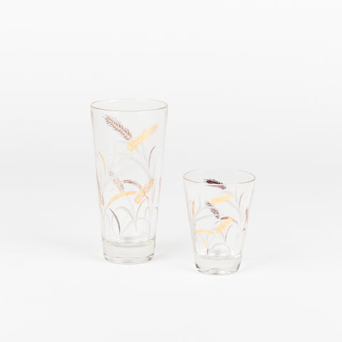 tall and short vintage drinking glasses with wrap around wheat pattern