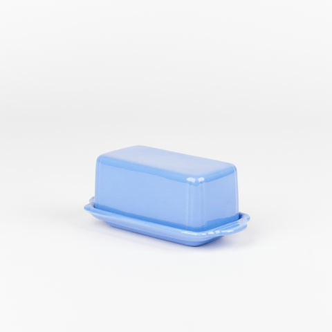 A vintage periwinkle blue ceramic butter dish