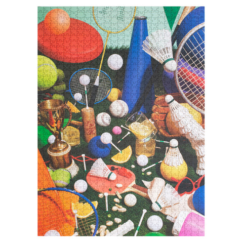 Bloom Boom puzzle picture showing a variety of sports equipment, rackets, golf balls and a trophy