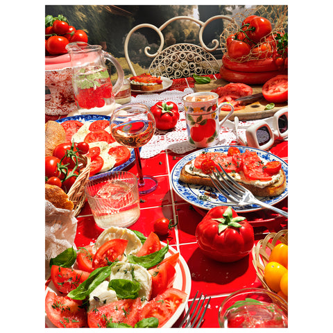 Bloom Boom puzzle picture showing an elaborate table scene with plates of food, tomatoes, basil, and cocktails,
