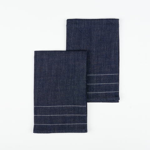 A pair of denim tea towels by Atelier Saucier.
