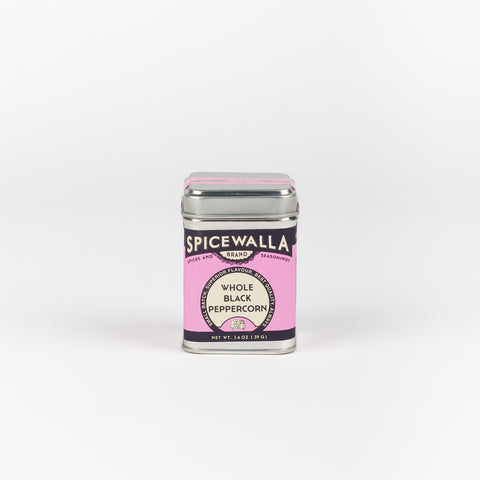 a small metal tin of Spicewalla Whole Black Peppercorns