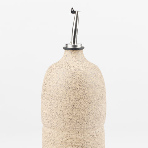 A detail view of the texture of the Utility Objects Sand oil cruet