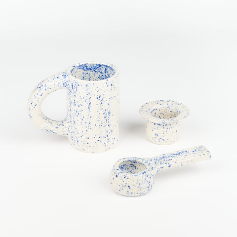 Blue Speckle Ceramic tea set including a mug, tea strainer, and scoop
