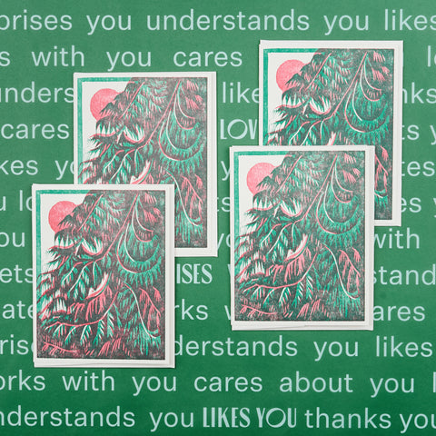 Set of four Heartell Press blank holiday note cards each with an illustration featuring cedar tree and a sunrise