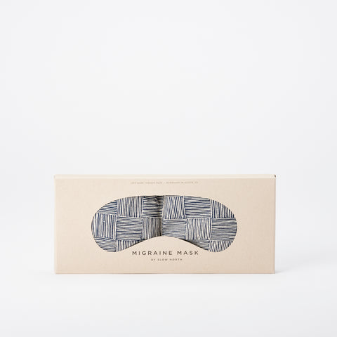Slow North Migraine eye mask with a blue checked pattern