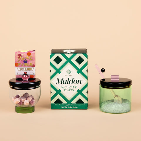 Perfect Balance gift set with Sophie Lou Jacobsen Everything Nice bowls, Maldon Sea Salt, and Leone candies arranged on a soft peachy-beige background.