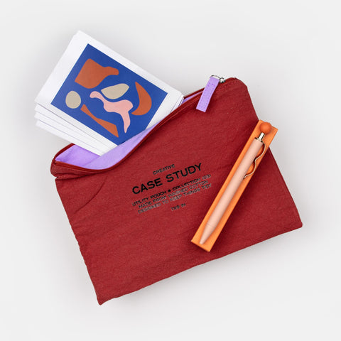 Creative Correspondence gift set with rust zipper pouch featuring lilac interior, writing pen, and first set of four artist notecards with envelopes—perfect for thank you or thinking of you gifts.