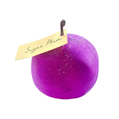 Purple glittery surpise ball with a 'Sugar Plum' tag on a white background