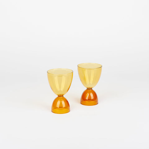 a pair of honey and amber hourglass shaped Mamo Classic glasses