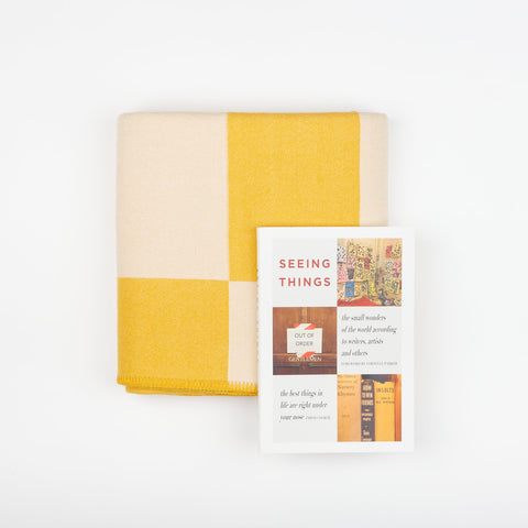 A Book and Blanket Gift set including a Manifatura wool throw blanket in Aspen and the DAP ArtBook Seeing Things - The Small Wonders of the World