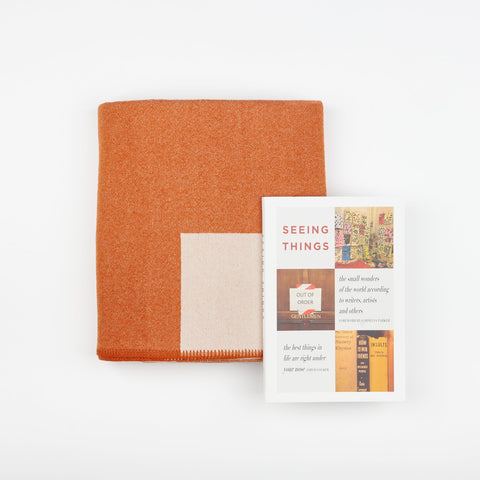 A Book and Blanket Gift set including a Manifatura wool throw blanket in Fox and the DAP ArtBook Seeing Things - The Small Wonders of the World