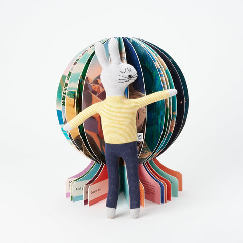 Phaidon Kids book Our World: First Book of Geography, a globe shaped book and a Sophie Home plush stuffed animal Rabbit toy
