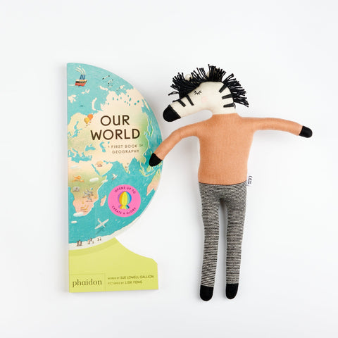 Phaidon Kids book Our World: First Book of Geography and a Sophie Home plush stuffed animal Zebra toy