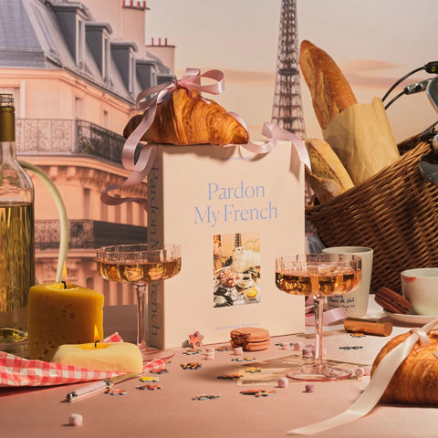 French bistro scene featuring the Pardon My French puzzle with a white cat