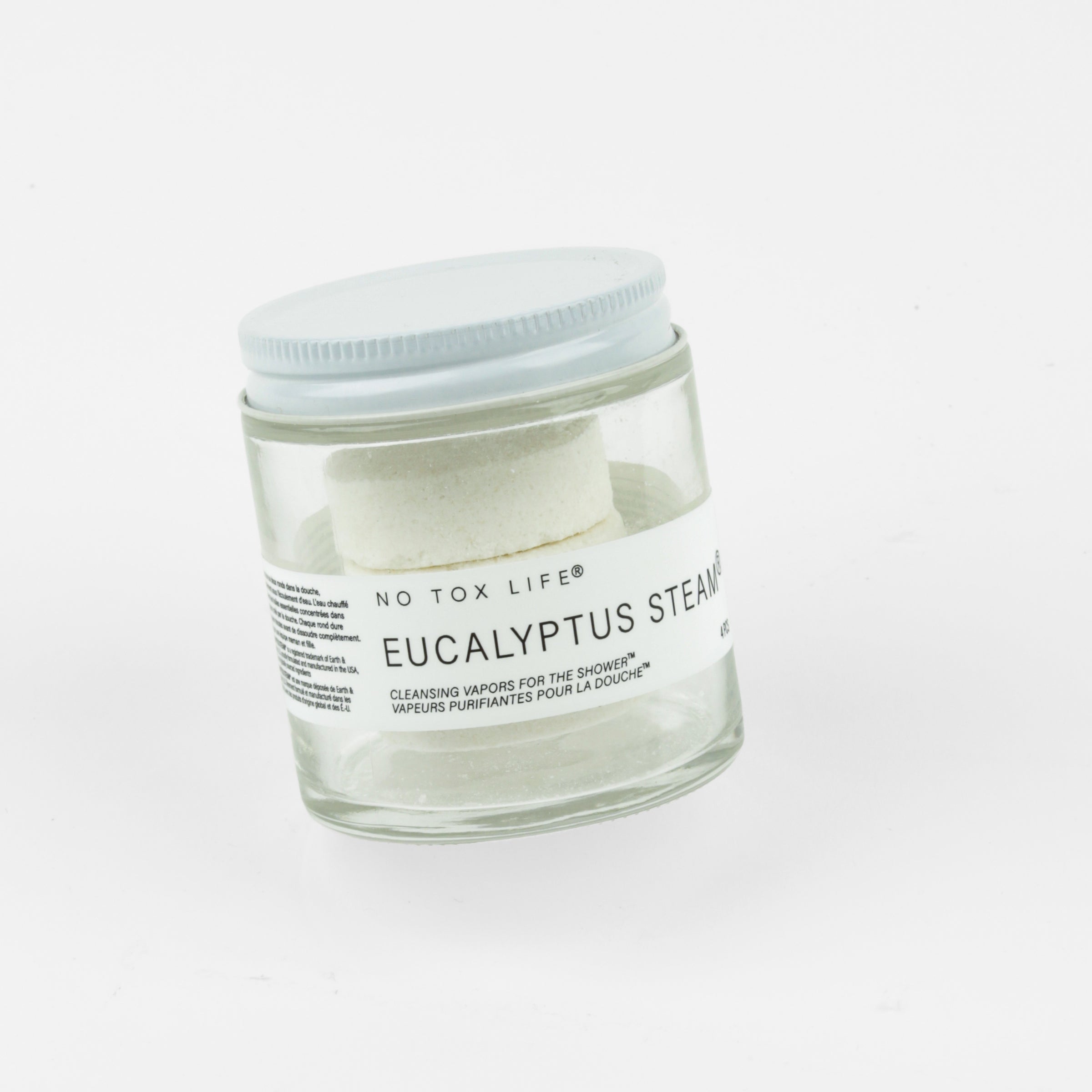 Glass jar of shower steamers