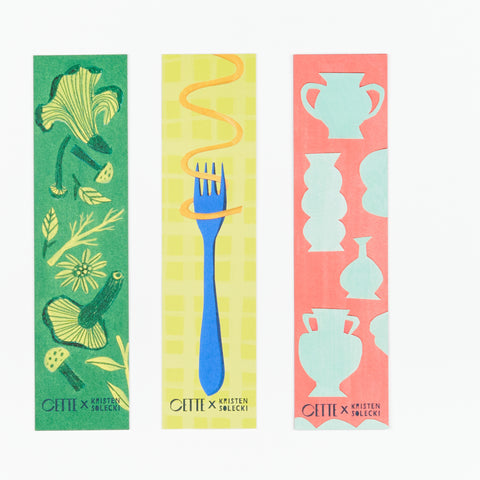 Three artist designed bookmarks featuring the following themes - nature, food and art