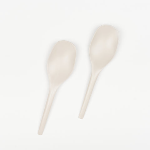 pair of stone colored Ekobo serving spoons