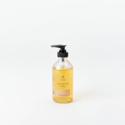 Tangerine Clove Fillaree hand soap in a glass bottle