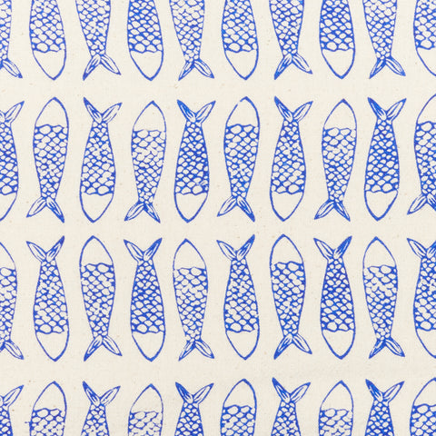 close up of blue fish pattern with scales repeating and going in opposite directions