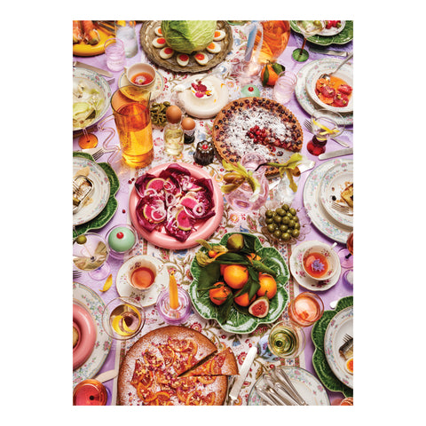 Bloom Boom puzzle picture showing an elaborate table filled with fruit, colorful plates of food and drinks