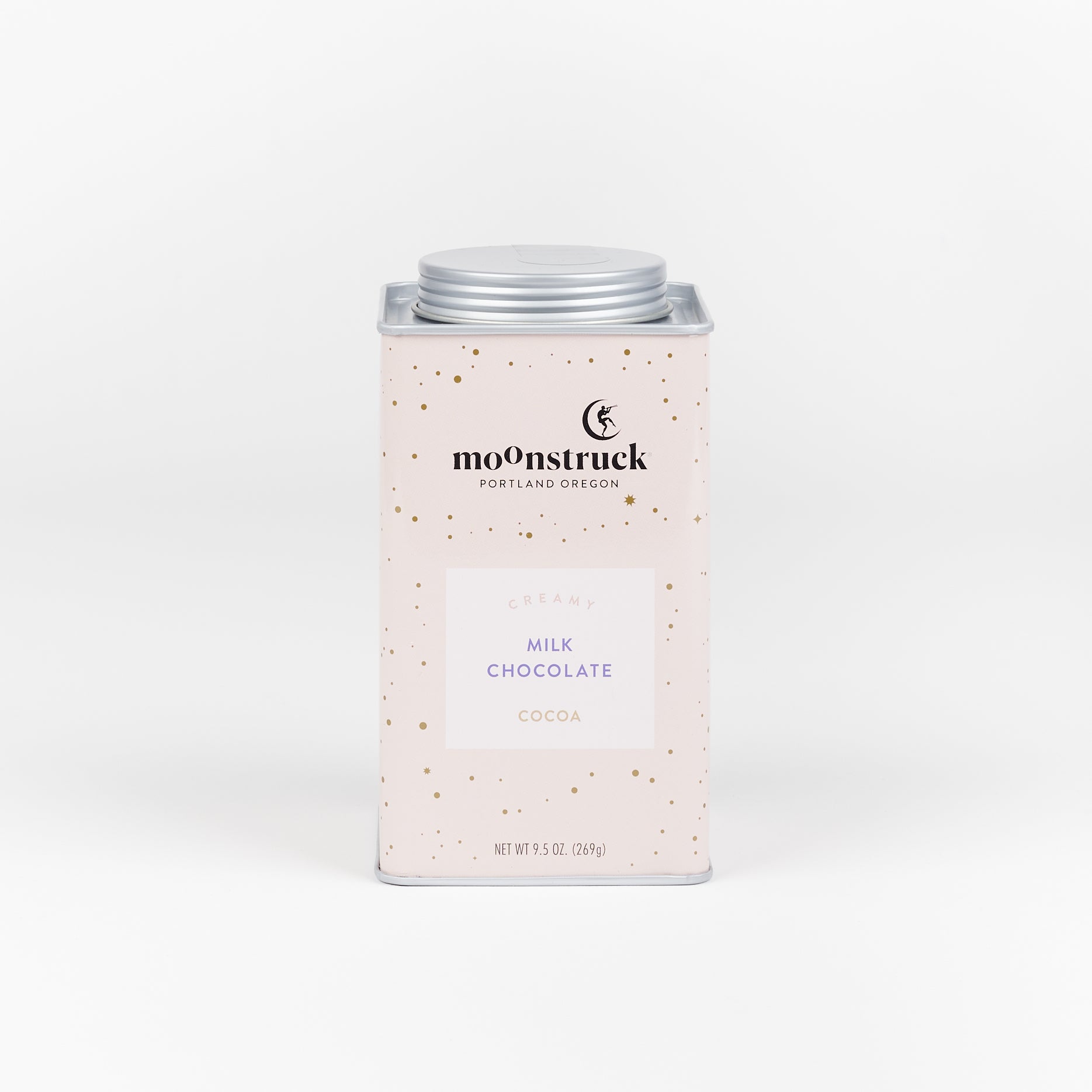 A pale pink tin of Moonstruck Creamy Milk Chocolate cocoa mix