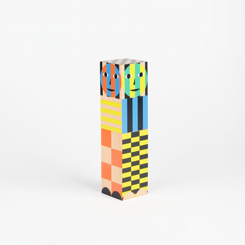 Areaware's Everybody Pepper Grinder in black with a variety of colorful geometric patterns on each side