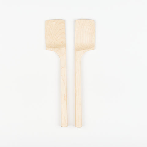 a pair of two Bad Dogs Studio maple wooden spatulas
