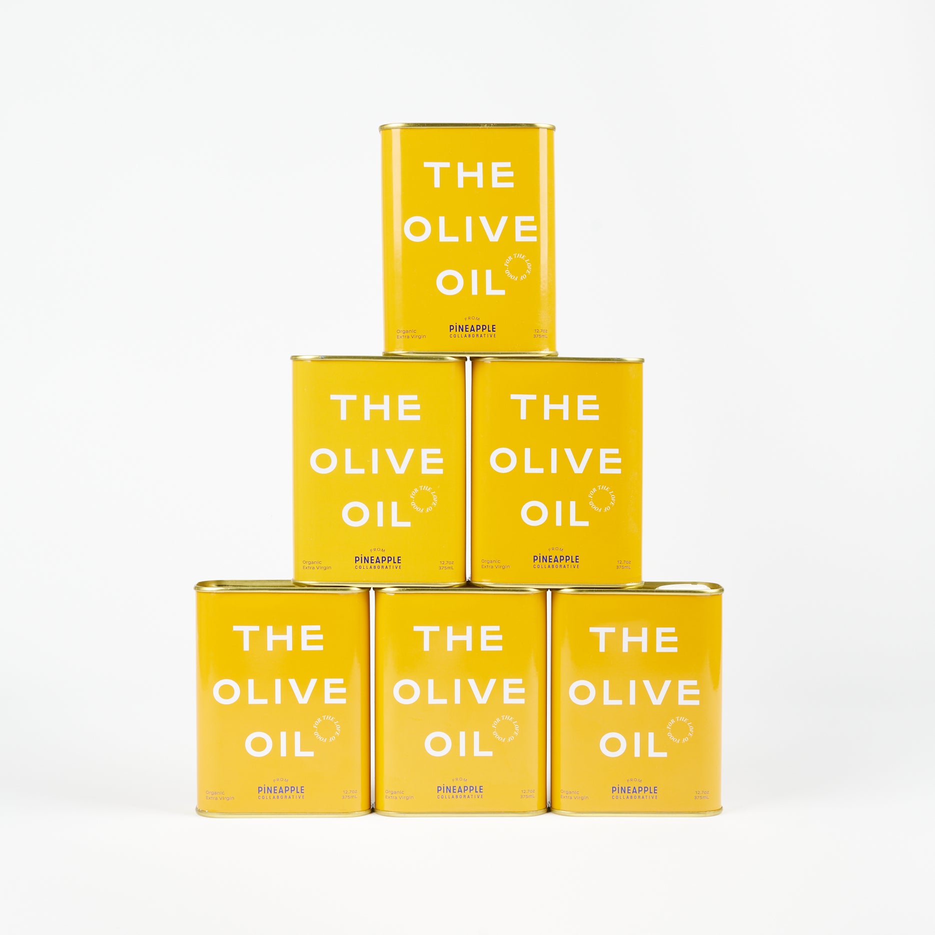 A stack of six tins of Pineapple Collaborative Marigold Mini Olive Oil on a white background