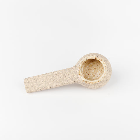 a sand speckle ceramic coffee scoop handmade by Utility Objects