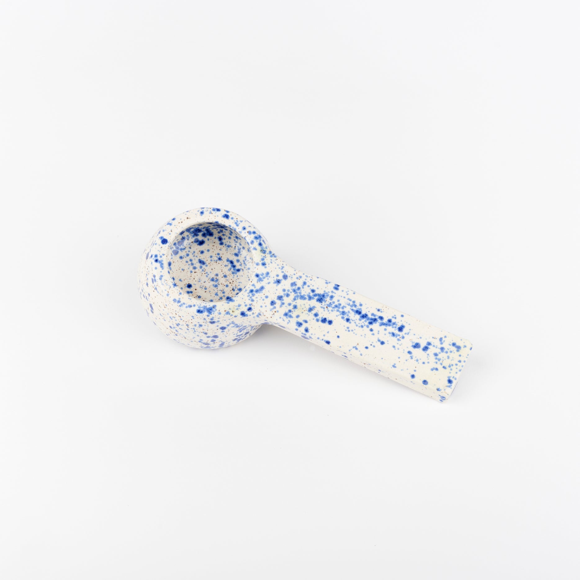 a blue speckle ceramic coffee scoop handmade by Utility Objects