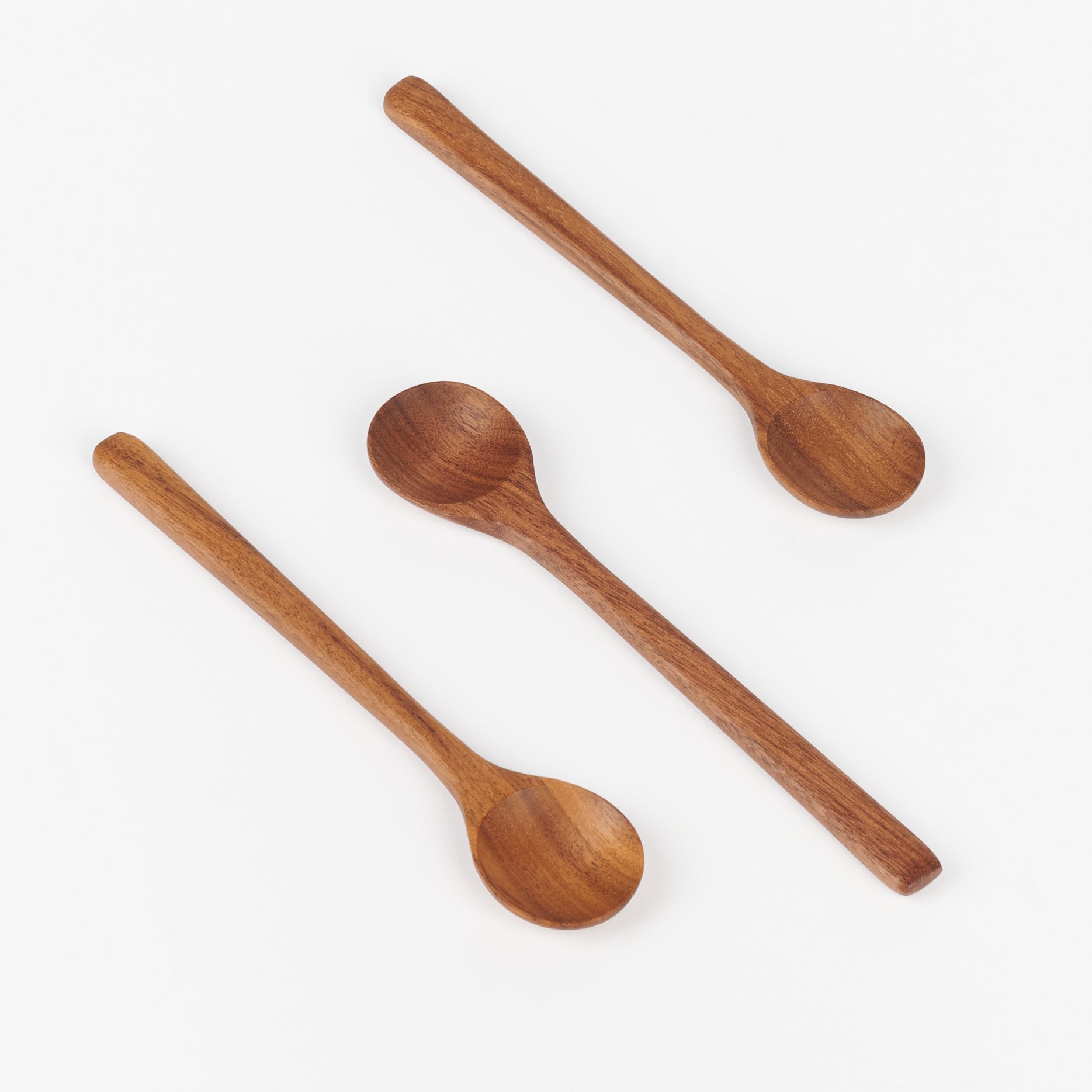 Three small walnut wooden stirring spoons