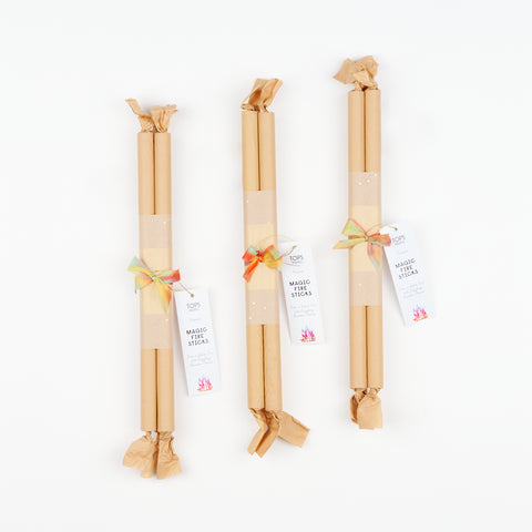 three wrapped bundles of Tops Malibu Magic Fire Sticks