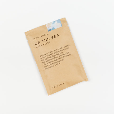 a brown paper packet of bath salts by Slow North in Of the Sea scent