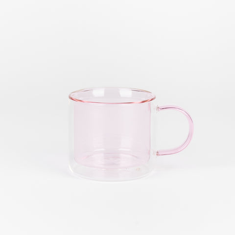 A Poketo Double Wall Mug made of borosillicate glass in Pink