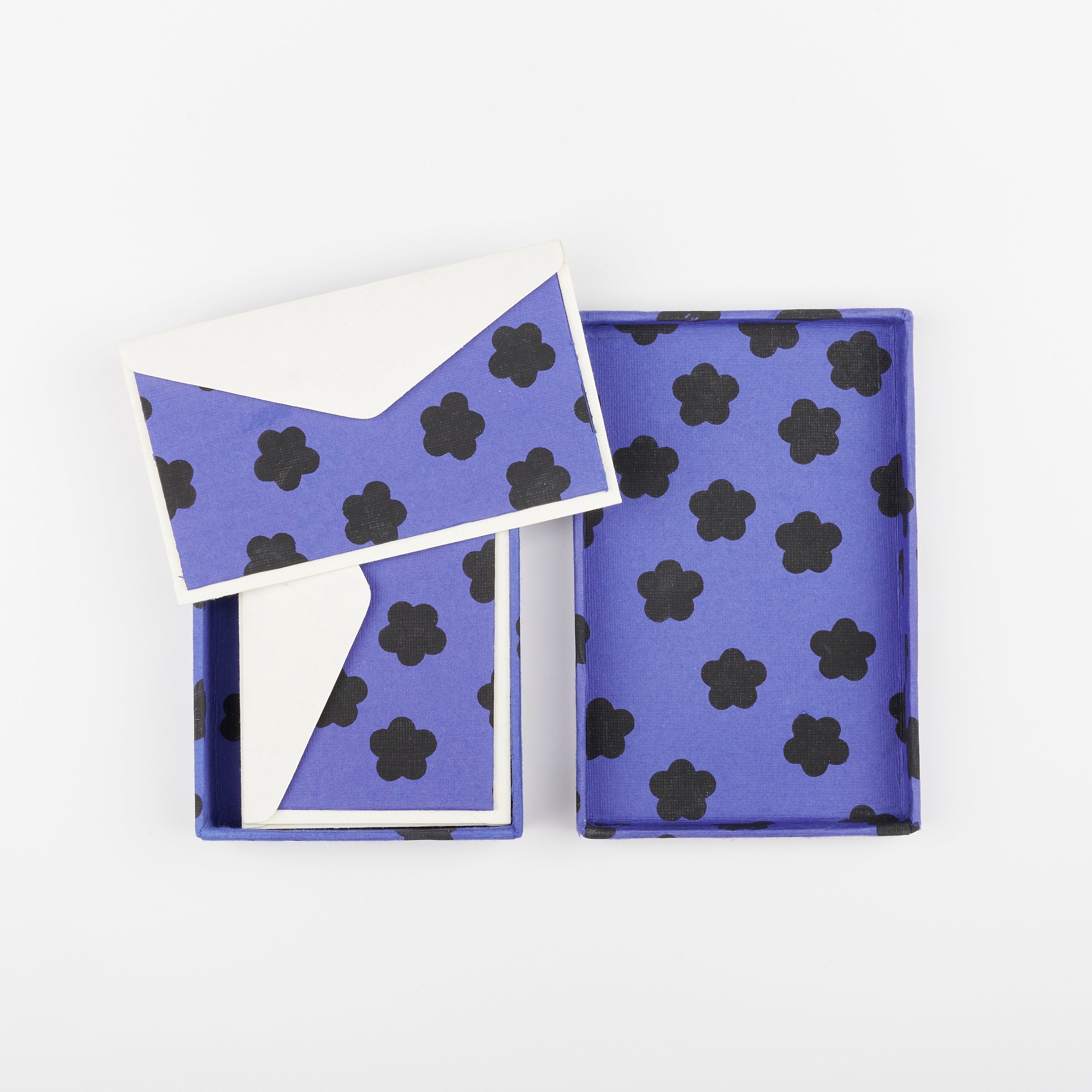 Hataguchi open box of blue cards with small black abstract flowers