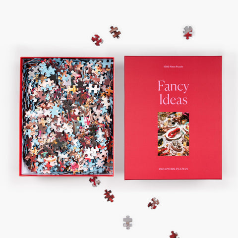 Fancy Ideas 1000-piece puzzle with pieces partially assembled, showing the design and details.