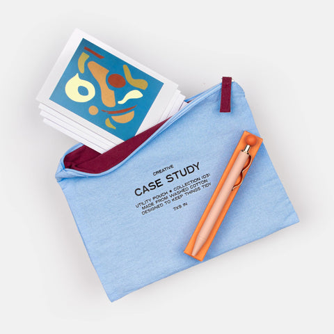 Creative Correspondence gift set with blue zipper pouch featuring burgundy interior, writing pen, and second set of four artist notecards with envelopes—perfect for thank you or thinking of you gifts.