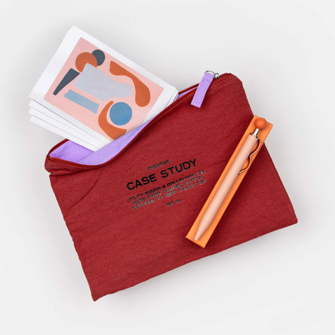 Creative Correspondence gift set with rust zipper pouch featuring lilac interior, writing pen, and second set of four artist notecards with envelopes—perfect for thank you or thinking of you gifts.