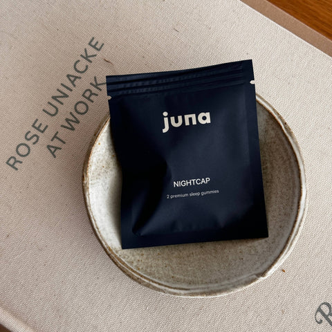 Juna Nightcap package on a textured surface with 'Rose Uniacke at Work' text.
