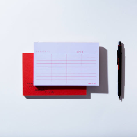 Case Study list notepad with red cover, with interior page view showing list layout, included in the Clarity Kit gift set.