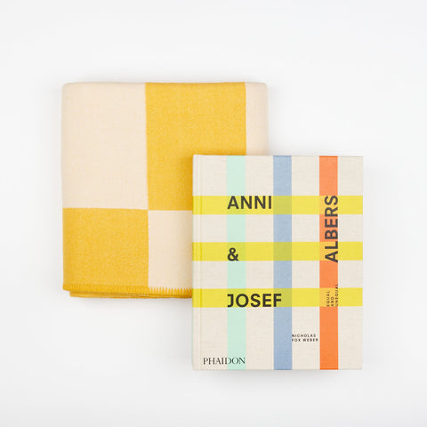 A Book and Blanket Gift set including a yellow Manifatura wool throw blanket in Aspen and the Phaidon Art book Anni & Josef Albers - Equal and Unequal
