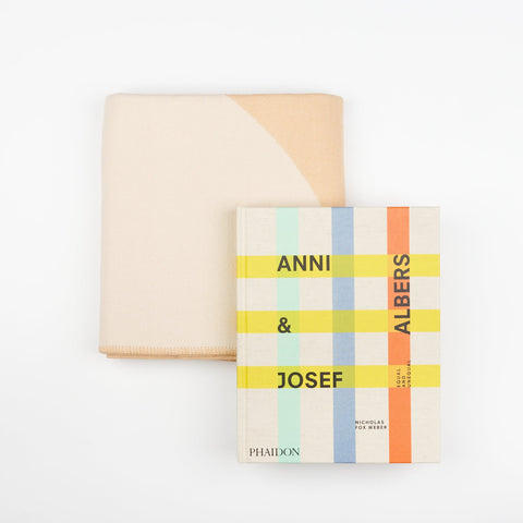 A Book and Blanket Gift set including a Manifatura wool throw blanket in Crema and the Phaidon Art book Anni & Josef Albers - Equal and Unequal